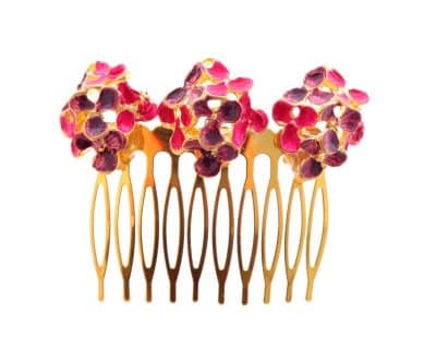 Peinecillo en oro mate pintado en morado y rosa