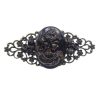 Black cameo flamenco brooch with gold highlights
