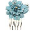 Peinecillo de flamenca pequeño con flor de tela celeste y reflejos dorados