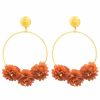Flamenco gold earring with orange fabric flower and golden highlights